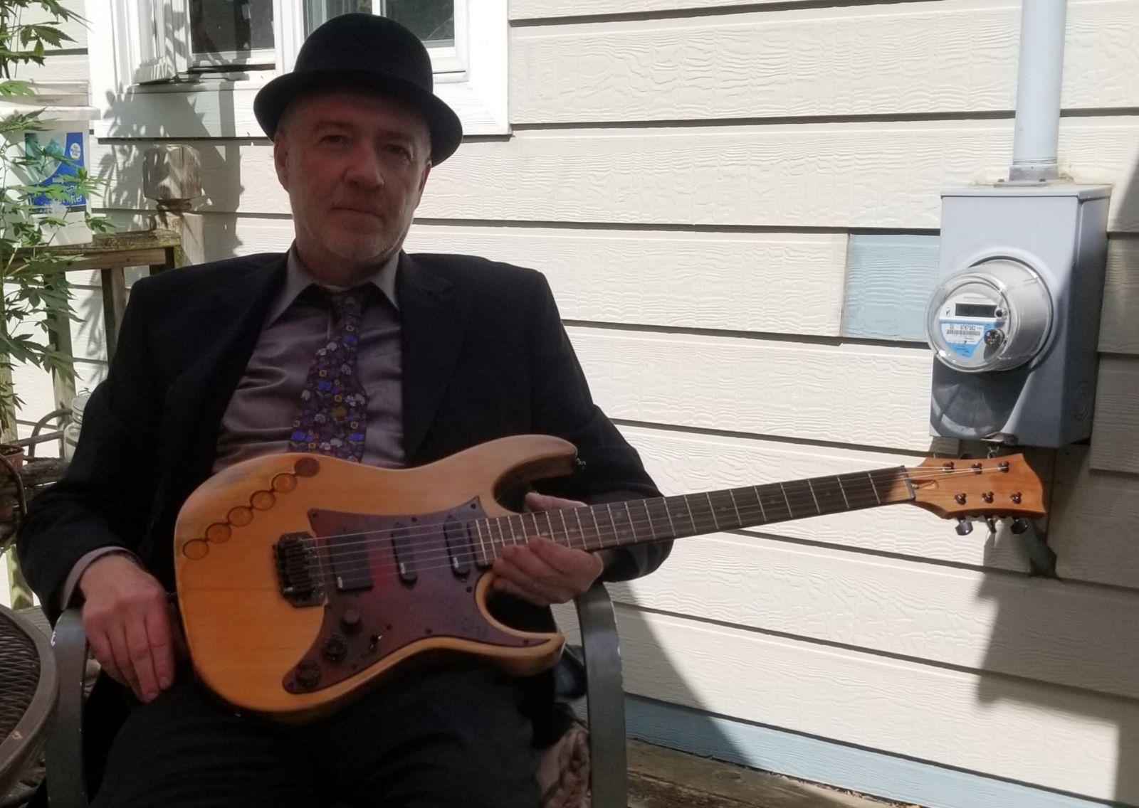 Powers of the Monk performing Bread & Circuses with emotional vocals, brooding guitar, haunting violin, and guest drummer John O'Reilly Jr.